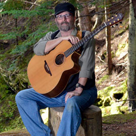 Posed, bright-eyed and bushy-tailed (you'll just have to trust me on this), in the woods, 2019. Photo by Robert Calnen.